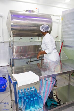 manual filling line with overhead tank